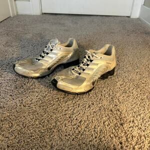 Silver and white nike